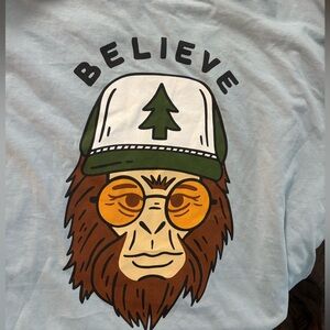 Clyde the Sasquatch Tee |
Light Blue Graphic T-Shirt #011
